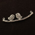 Antikolt ezüst színű madaras ág függő dísz hátulja